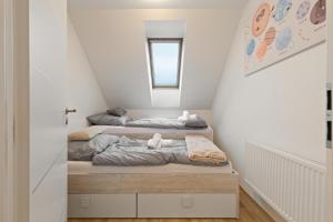 Postel nebo postele na pokoji v ubytování Home Dalov