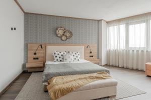 Una cama o camas en una habitación de WN LAB Hotel - including breakfast and parking