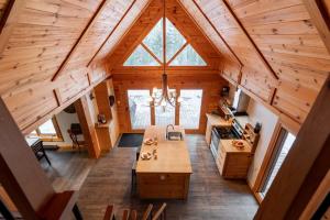 an overhead view of a kitchen in a log cabin at Zazz - For precious moments with family or friends in Chertsey +41 photos