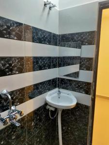Koupelna v ubytování Saya's Abode - Railview Suites