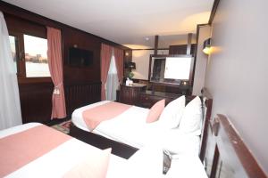 Voodi või voodid majutusasutuse YOU Nile View Hotel toas