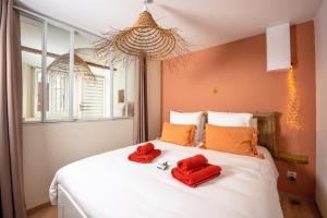 Postel nebo postele na pokoji v ubytování Lodge Bonaparte - Charmant T2 Lumineux