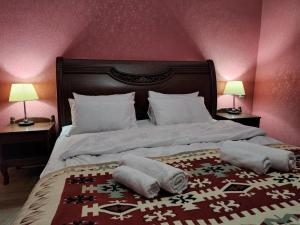 Voodi või voodid majutusasutuse Guest House Fango toas