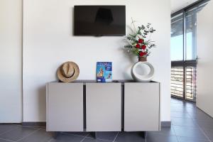 TV a/nebo společenská místnost v ubytování Appart'hôtel Odalys City - Marseille Prado
