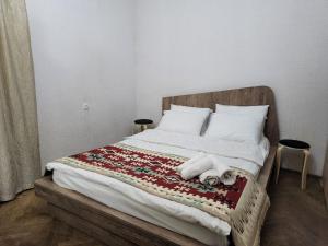 Voodi või voodid majutusasutuse Guest House Fango toas