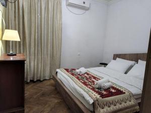 Voodi või voodid majutusasutuse Guest House Fango toas