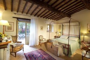 Säng eller sängar i ett rum på Borgo Della Marmotta