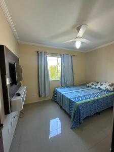 Et tv og/eller underholdning på Condomínio Residencial Marina Clube