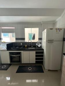 Køkken eller tekøkken på Condomínio Residencial Marina Clube