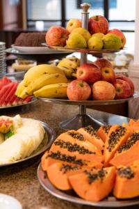 a bunch of plates of food on a counter at Monreale Plus Midtown Campinas in Campinas