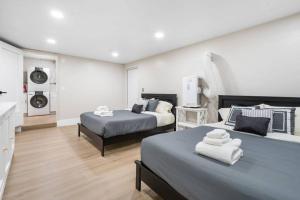 Ένα ή περισσότερα κρεβάτια σε δωμάτιο στο Sunshine Breeze Retreat #913