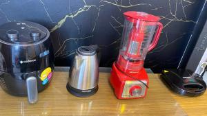 Příslušenství pro přípravu čaje a kávy v ubytování Apartamento Exclusivo Portal da Ferradura + 16 fotografií