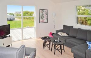 Posezení v ubytování Holiday Home Fasanvej Løkken V