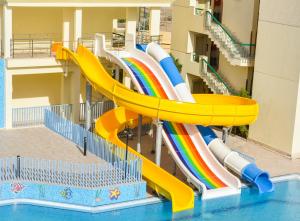 a pool with a bunch of surfboards on top of it at Swiss Inn Resort Hurghada in Hurghada