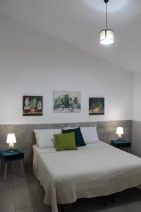 Posteľ alebo postele v izbe v ubytovaní Elena House Castelluccio