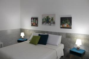 Posteľ alebo postele v izbe v ubytovaní Elena House Castelluccio