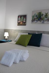 Posteľ alebo postele v izbe v ubytovaní Elena House Castelluccio