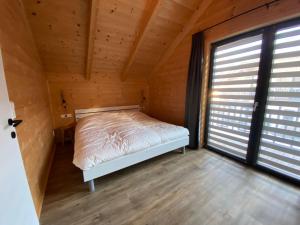 Posteľ alebo postele v izbe v ubytovaní Nassfeld Holiday Home