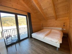 Posteľ alebo postele v izbe v ubytovaní Nassfeld Holiday Home