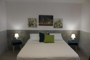 Posteľ alebo postele v izbe v ubytovaní Elena House Castelluccio