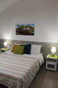 Posteľ alebo postele v izbe v ubytovaní Elena House Castelluccio