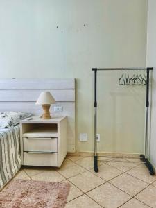 Postel nebo postele na pokoji v ubytování Quarto em apto compartilhado com anfitrião