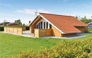 a house with an orange roof at Holiday Home Teglbakken Vi in Egernsund