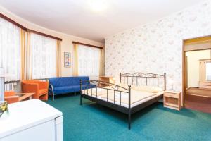 Posteľ alebo postele v izbe v ubytovaní Hotel Grand
