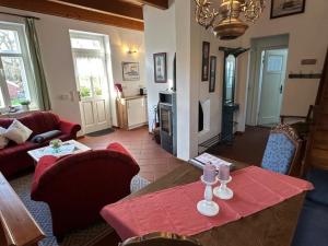 Posezení v ubytování Landhaus up de Warft - Friesenrose