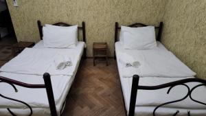 Voodi või voodid majutusasutuse Guest House Fango toas