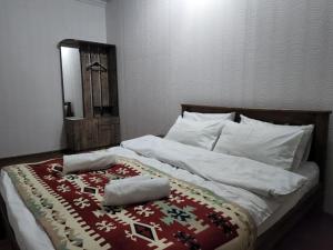 Voodi või voodid majutusasutuse Guest House Fango toas