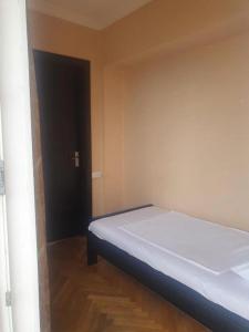 Voodi või voodid majutusasutuse Guest House Fango toas