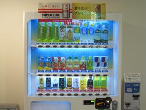 a refrigerator filled with lots of different types of drinks at Toyohashi Station Hotel in Toyohashi