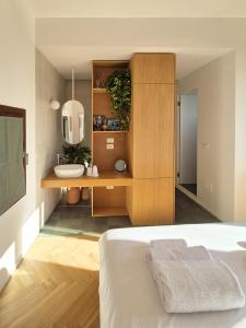 Postel nebo postele na pokoji v ubytování Suite Torre San Giorgio