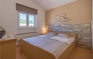 Posteľ alebo postele v izbe v ubytovaní Three-Bedroom Holiday Home Betiga With A Fireplace 02