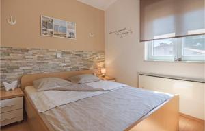 Posteľ alebo postele v izbe v ubytovaní Three-Bedroom Holiday Home Betiga With A Fireplace 02