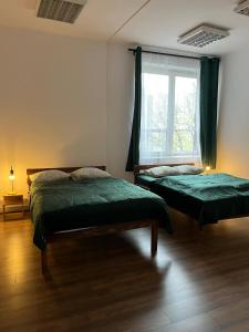 Posteľ alebo postele v izbe v ubytovaní Room in Old Town Krakow