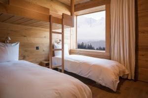 Postel nebo postele na pokoji v ubytování rocksresort