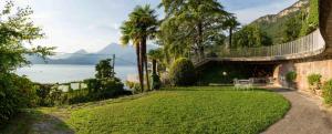 Casa con jardín y vistas al agua en Villa Lucy - Porzione di villa con giardino, en Varenna
