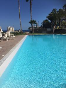 Bazén v ubytování BLUE PEARL - POOL - TERRACE - OCEAN VIEW - BEACH - WIFI - WONDERFUL Complex - FREE DIGITAL TRAVEL GUIDE nebo v jeho okolí