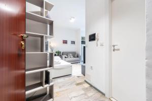 Televízia a/alebo spoločenská miestnosť v ubytovaní Suite 12 Milano centro parking free