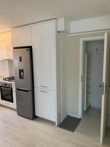 Køkken eller tekøkken på Ammi - Central Apartment - Galati