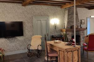 TV a/nebo společenská místnost v ubytování La Vieux Gare De Freyneux
