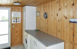 Kuchyň nebo kuchyňský kout v ubytování Holiday Home Tranebærvej Ålbæk V + 7 fotografií