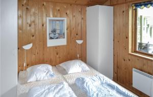 Postel nebo postele na pokoji v ubytování Holiday Home Tranebærvej Ålbæk V