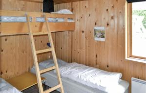Postel nebo postele na pokoji v ubytování Holiday Home Tranebærvej Ålbæk V