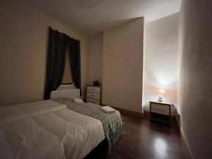 Letto o letti in una camera di Gr8 Hostel at The Mount