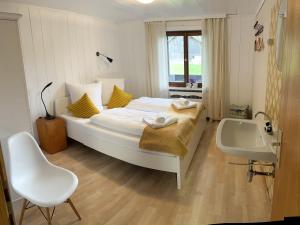 Postel nebo postele na pokoji v ubytování Sonnes Apartment