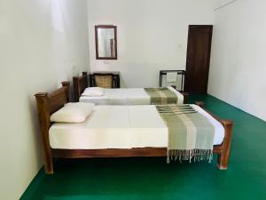 Postel nebo postele na pokoji v ubytování Kingfisher Resort & Retreat Sigiriya + 22 fotografií