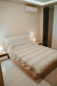 Postel nebo postele na pokoji v ubytování Varna City Apartment
